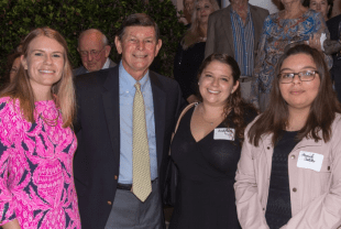 Group of people at celebration of Orchid Island presenting Awards Educational Scholarships