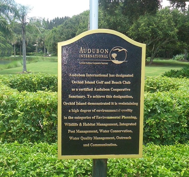 Audubon International plaque awarded to Orchid Island, signifying the club's environmental stewardship and Audubon certification.