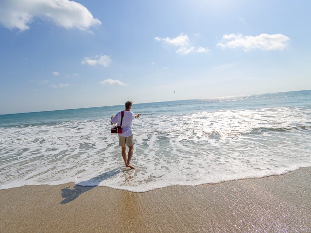 Man surf fishing in the ocean at Vero Beach