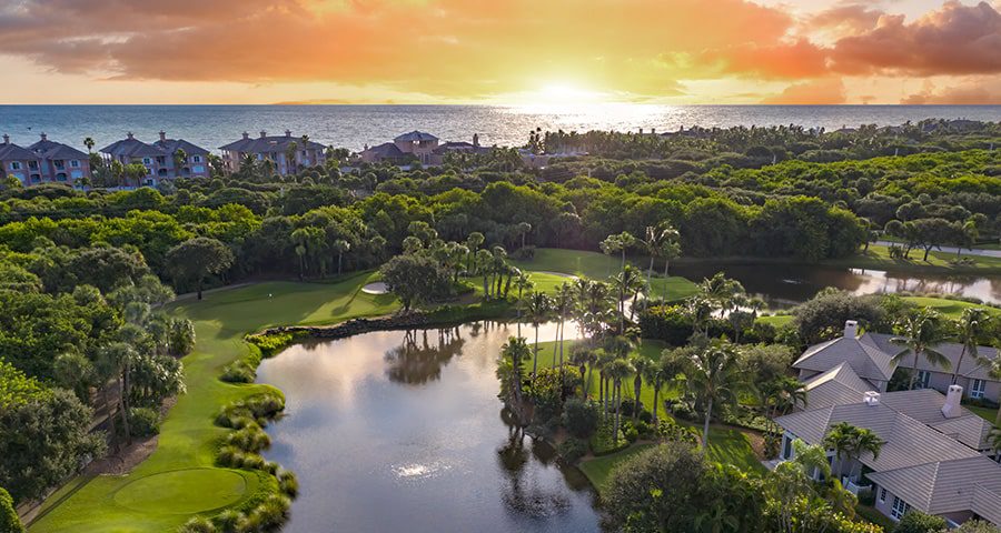 sun setting over the arnold palmer golf course at orchid island