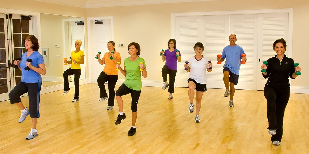 Group of people taking a fitness class at Orchid Island.