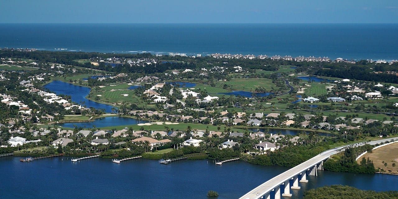 Aerial image of Orchid Island, FL showing both the inlet and the ocean.