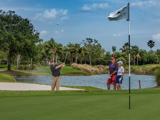 Man hits out of bunker at Orchid Island Golf Club