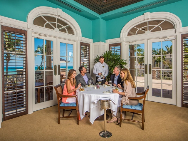 Couples enjoying Orchid Island Clubhouse Dinner