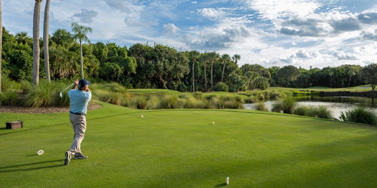 man playing golf on the orchid island course