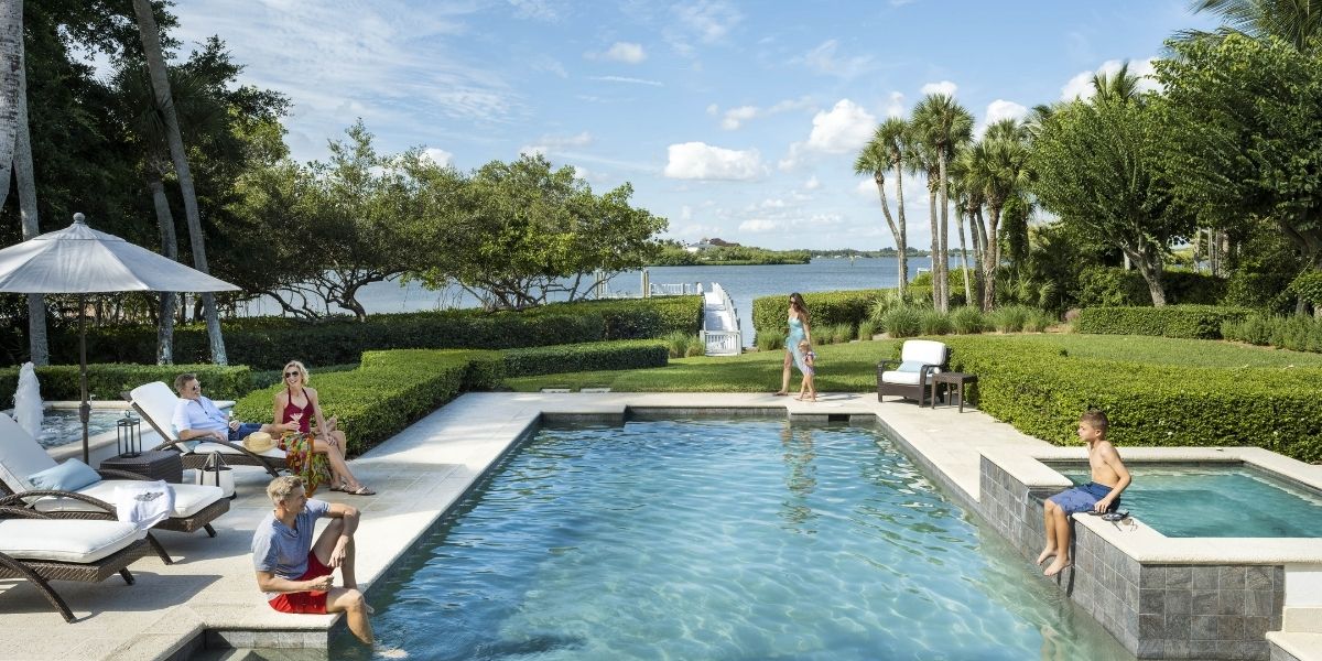 waterfront pool at orchid island and family