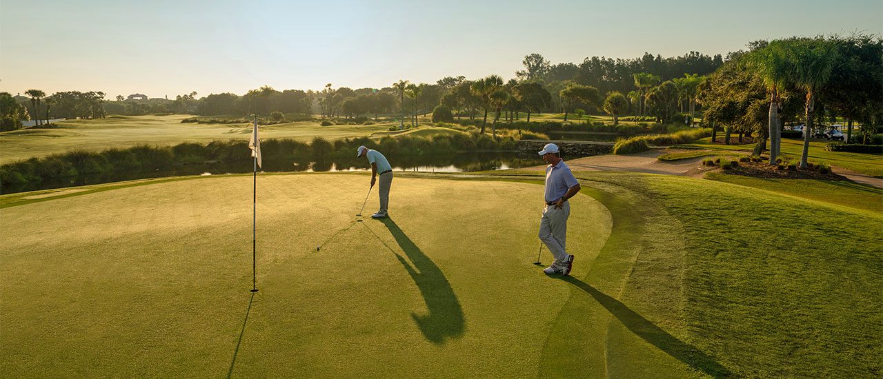 Members of the orchid island golf club playing