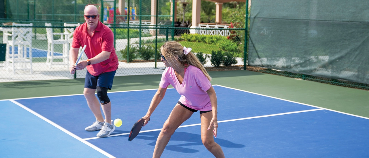 Members playing pickleball at Orchid Island’s private Florida club