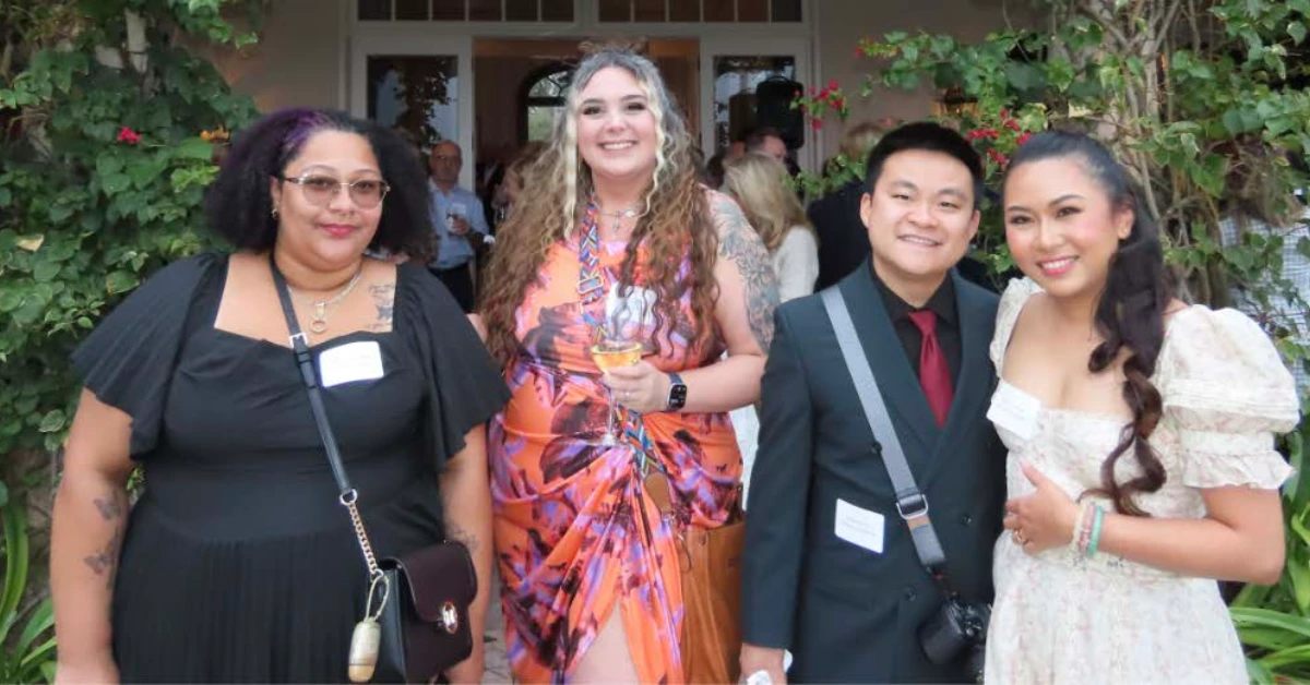 Orchid Outreach scholarship recipients at awards event in Vero Beach